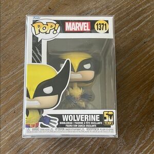 Funko Pop Marvel Wolverine Figure - Yellow and Blue